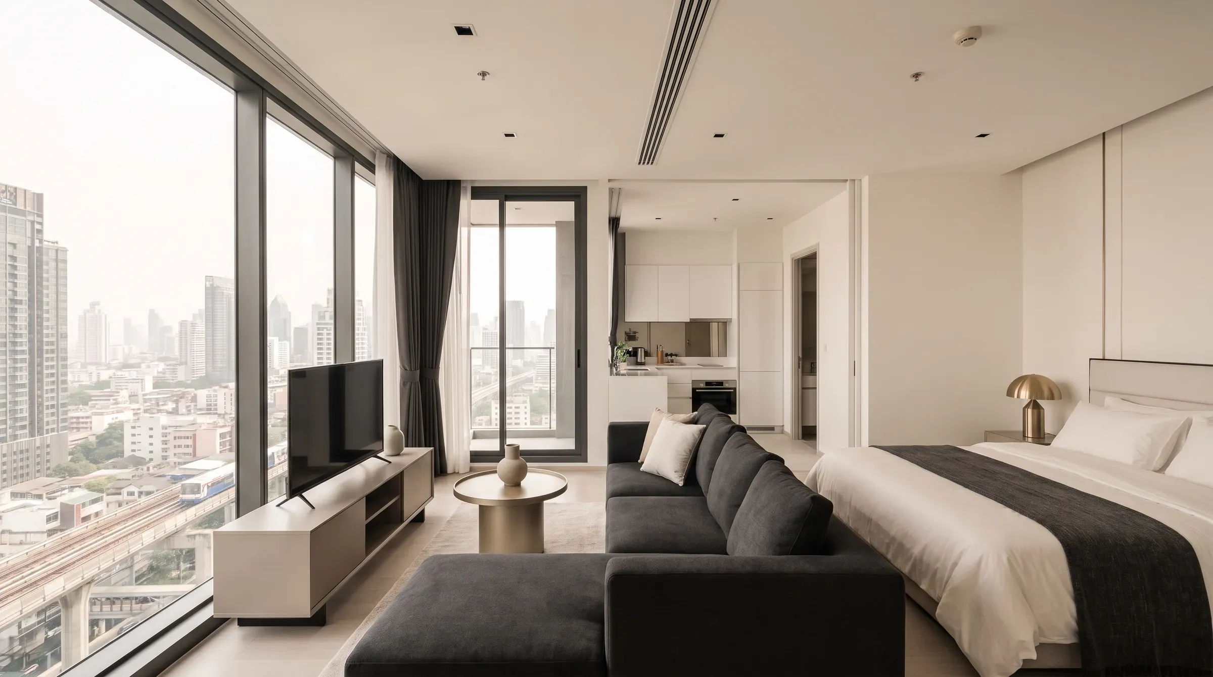 Newly furnished Bangkok condo bedroom and living area ready for rental tenants